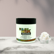 Cargar imagen en el visor de la galería, Mascarilla post-alisado con ingredientes naturales y nutritivos en mármol con manteca de karite en un cuenco al lado
